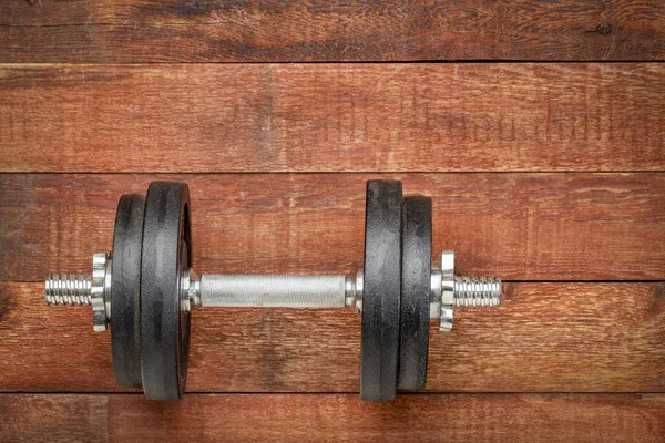 Heavy Iron Dumbbell Rustic Wood Background Fitness Concept — Stock Photo, Image