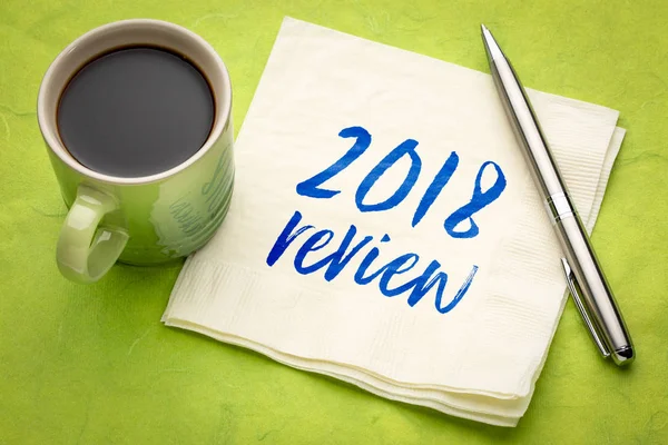 2018年评论文本 用一杯咖啡在餐巾纸上的笔迹 — 图库照片