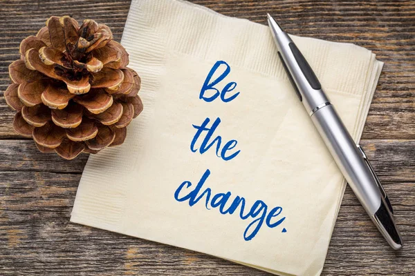 Be the change reminder - inspirational handwriting on a napkin