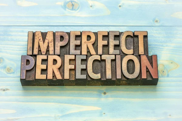 imperfect perfection word abstract in vintage letterpress wood type prinitng blocks