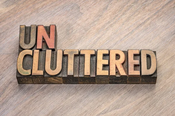 Uncluttered word in wood type — Stock Photo, Image