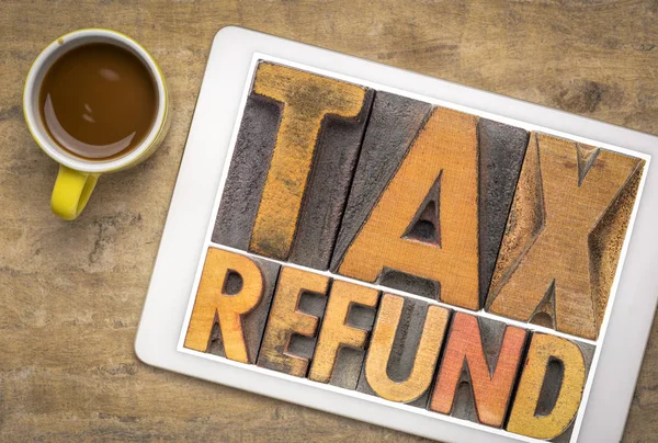 Tax refund word abstract in wood type — Stock Photo, Image