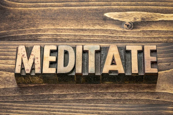 Meditate word in wood type — Stock Photo, Image