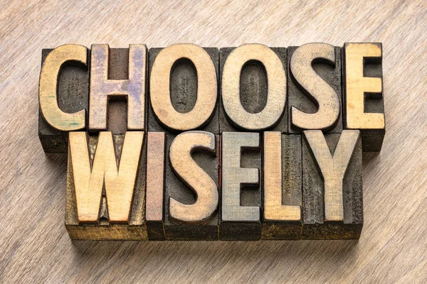 Choose wisely word abstract in wood type — Stock Photo, Image