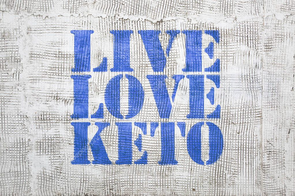 Live, love keto -  graffiti on stucco wall
