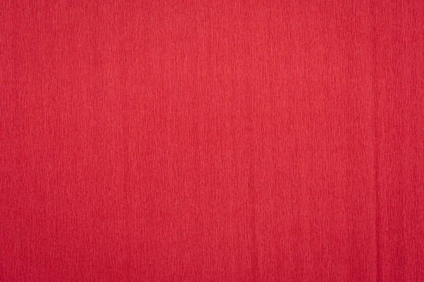 Red crepe paper background — Stock Photo, Image