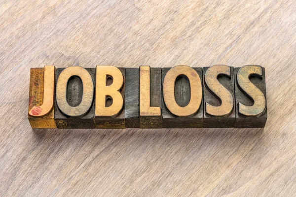 job loss text in wood type