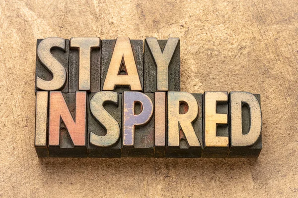 Stay inspired - words in wood type — Stock Photo, Image