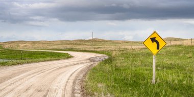 windy dirt road in Nebraska Sandhills clipart