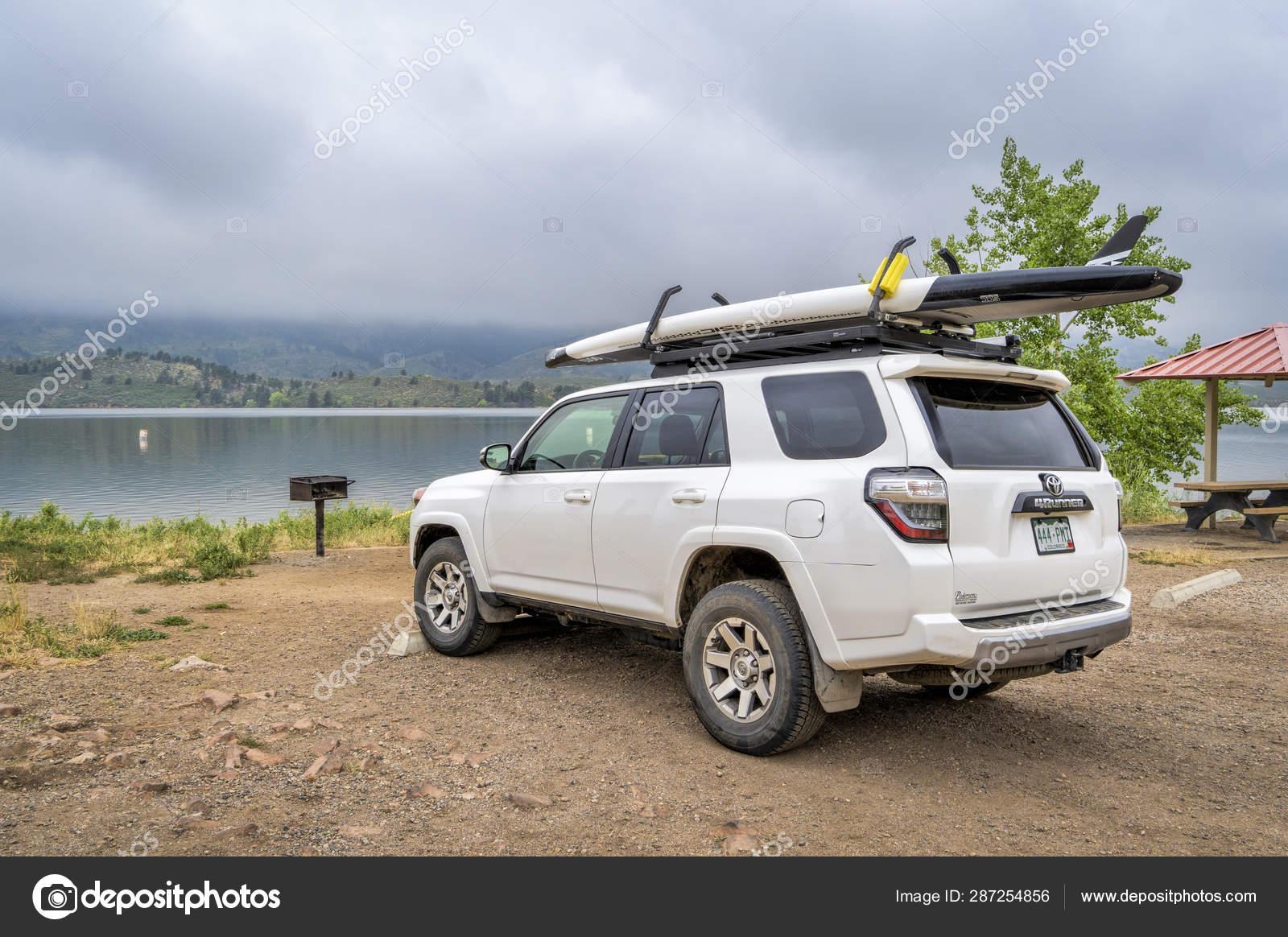 Paddle Board Car Racks >> Toyota 4runner With Stand Up Paddleboard Stock Editorial Paddle Board Car Racks >> Toyota 4runner With Stand Up Paddleboard Stock Editorial
