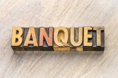 banquet word abstract in wood type clipart