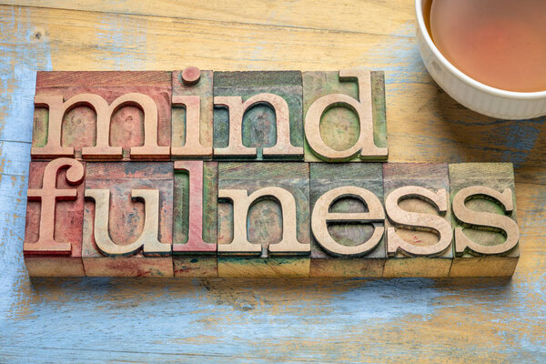 mindfulness word abstract in letterpress wood type