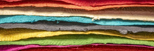 Collectie van kleurrijke getextureerde vellen papier — Stockfoto