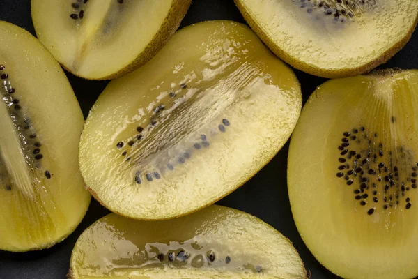 Closeup of cut gold kiwifruit — Stock Photo, Image