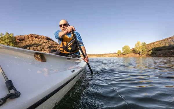 Paddling expedition canoe on lake POV — Stock Photo, Image