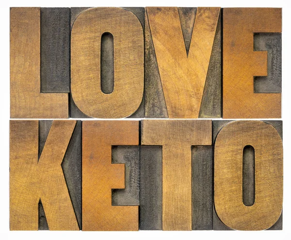 Love keto word abstract in wood type — Stock Photo, Image