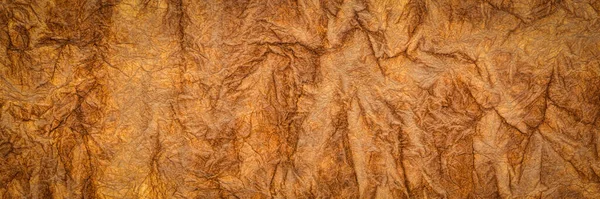烧焦的锡耶纳 背景和质地的背光手工尼泊尔木乃伊纸 全景横幅 — 图库照片