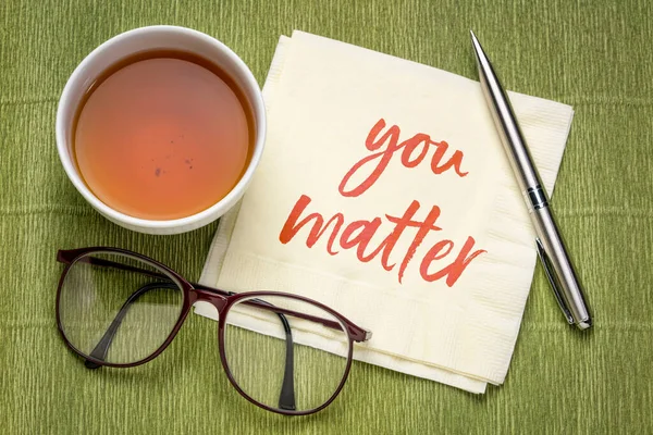 You matter inspirational note - handwriting on a napkin with a cup of tea, positive affirmation, self confidence and personal development concept