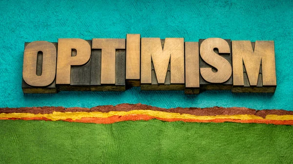 Palabra Optimismo Abstracto Tipografía Tipo Madera Contra Abstracto Paisaje Papel — Foto de Stock