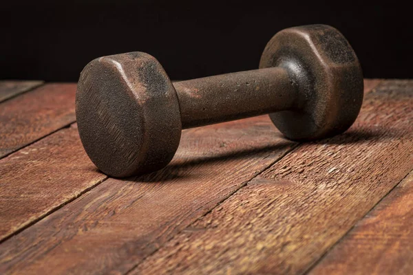 Vintage Rusty Iron Dumbbell Grained Barn Wood Background Fitness Concept — Stock Photo, Image