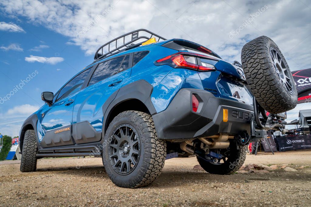 Loveland, CO, USA - August 22, 2025: Subaru Crosstrek 4wd SUV in Wilderness trim with a logo and emblem.