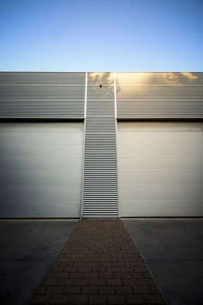 Access of metal doors to a modern industrial building in Europe