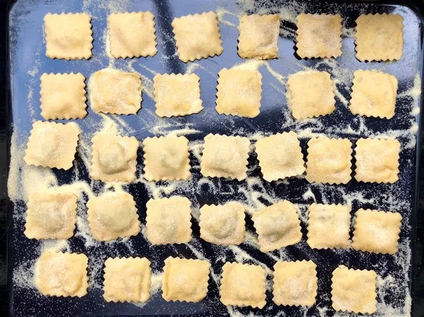 Making fresh ravioli or tortellini — Stock Photo, Image