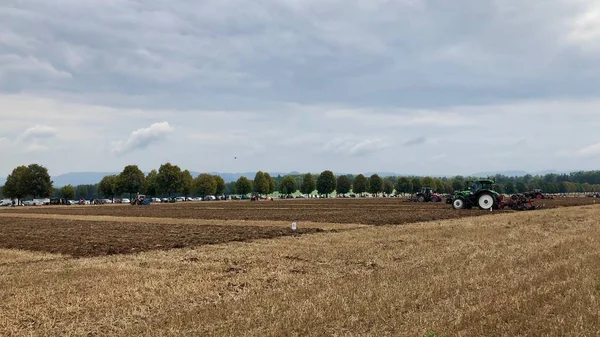 International contestants plowing their plots during the World Ploughing Competition in Germany 2018 — Stock Photo, Image