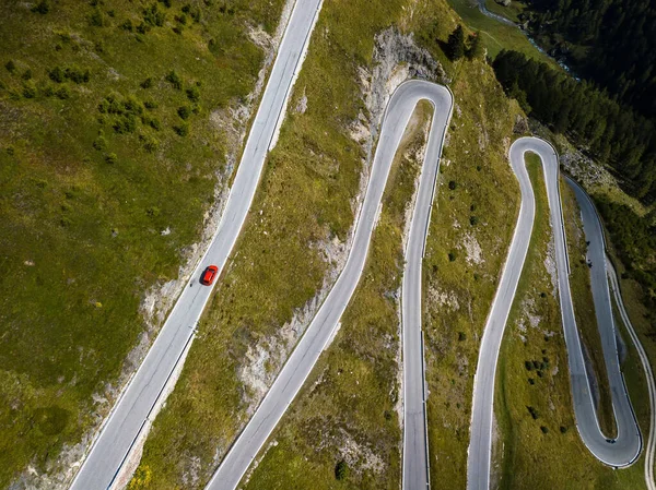 Aerial top view on scenic curvy mountain pass road to the Timmelsjoch at the border of Italy and Austria in the Alps Stock Photo