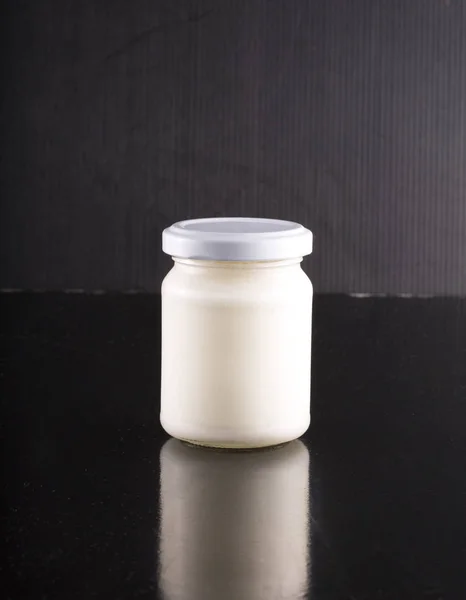 White jar over black backgorund — Stock Photo, Image