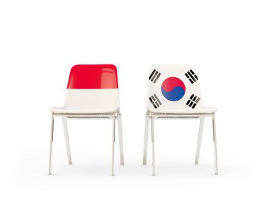 Endonezya ve Güney Kore bayrakları taşıyan iki sandalye