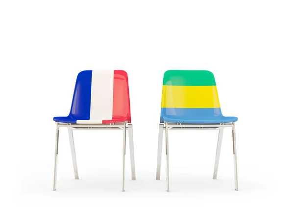 Two chairs with flags of France and gabon — Stock Photo, Image