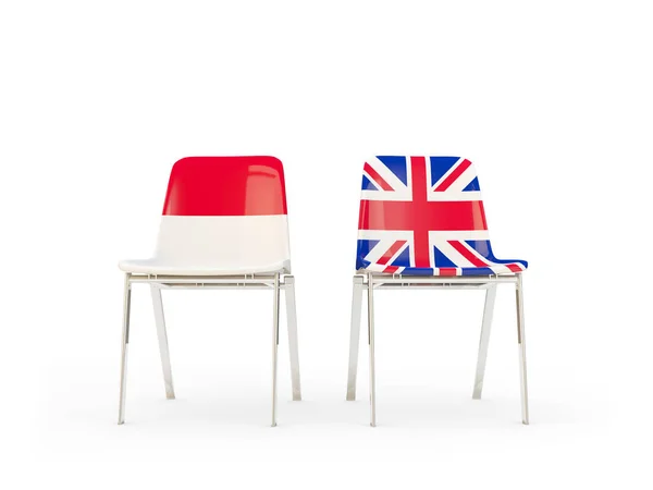 Δύο καρέκλες με σημαίες της Ινδονησίας και Ηνωμένο Βασίλειο — Φωτογραφία Αρχείου
