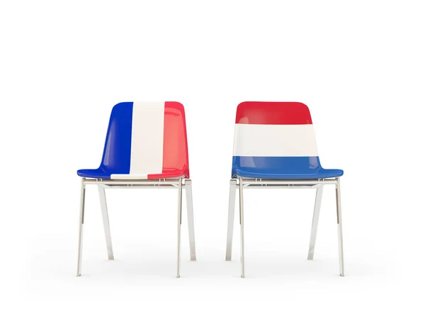 Dos sillas con banderas de Francia y los Países Bajos — Foto de Stock