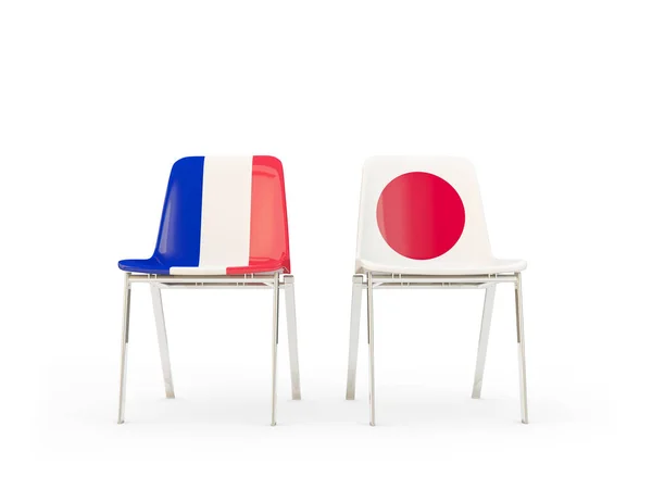 Twee stoelen met vlaggen van Frankrijk en japan — Stockfoto