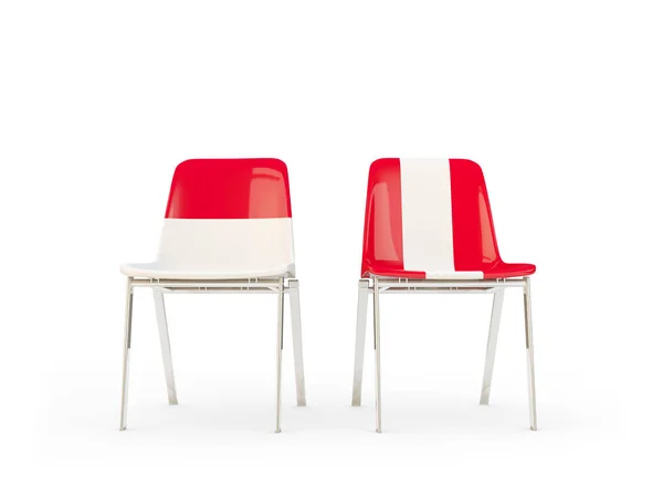 Duas cadeiras com bandeiras de Indonésia e peru — Fotografia de Stock