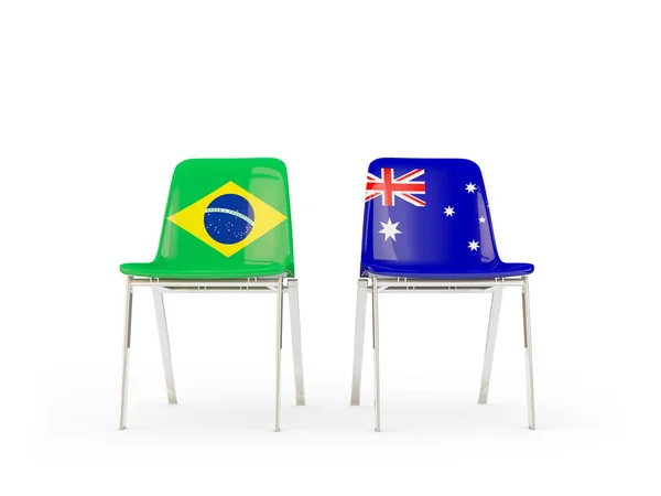 Brezilya ve Avustralya bayrakları taşıyan iki sandalye — Stok fotoğraf