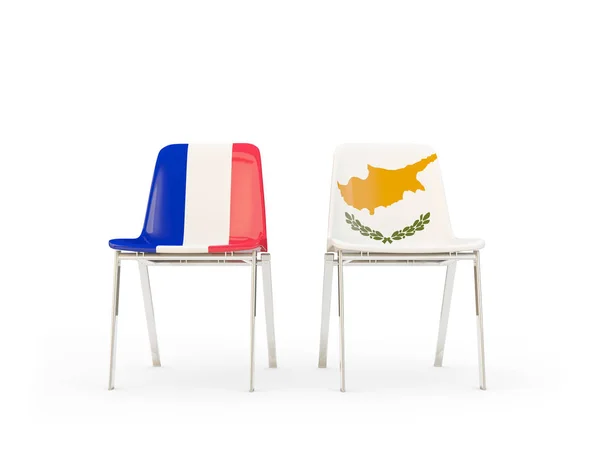 Dos sillas con banderas de Francia y cyprus — Foto de Stock