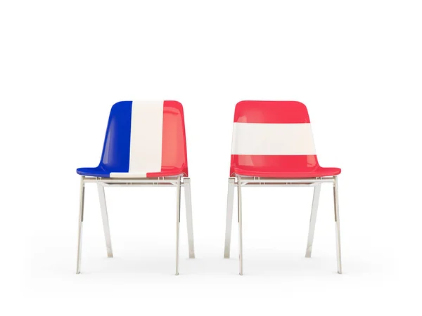 Dos sillas con banderas de Francia y austria — Foto de Stock