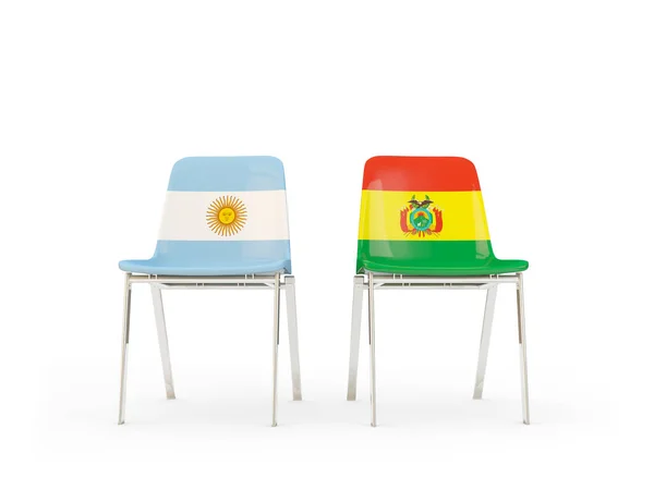 Dos sillas con banderas de Argentina y Bolivia — Foto de Stock