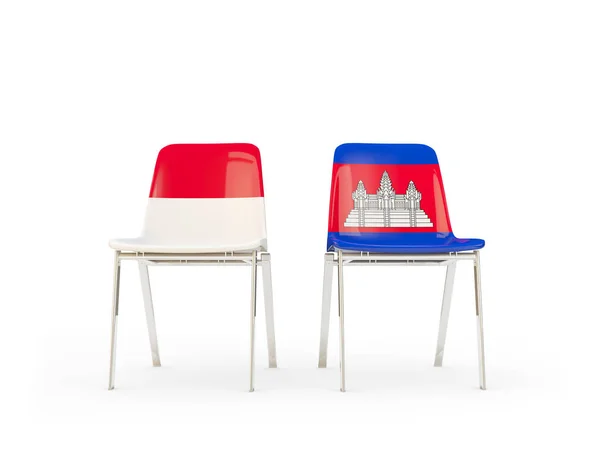 Duas cadeiras com bandeiras da Indonésia e cambodia — Fotografia de Stock