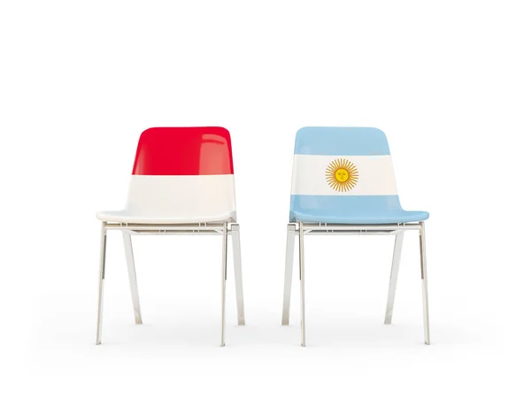 Twee stoelen met vlaggen van Indonesië en Argentinië — Stockfoto