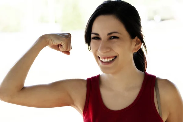 Young Latina Woman Outdoors Red Top Showing Biceps Smiling — Stock Photo, Image