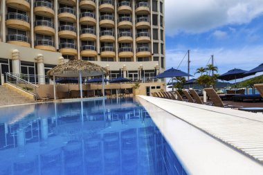 GRAND HOTEL,VANUATU - FEB 27: Scenery of the swimming pool at the Grand Hotel Resort & SPA.  clipart