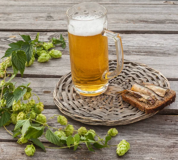 Glass Beer Next Sandwich Sprats Branch Hops Wooden Table — Stock Photo, Image