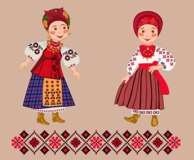 Ukrayna halk kıyafetleri içindeki iki genç kadın elbiselerini gösteriyor.