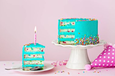 Colorful birthday cake with one slice and a candle clipart