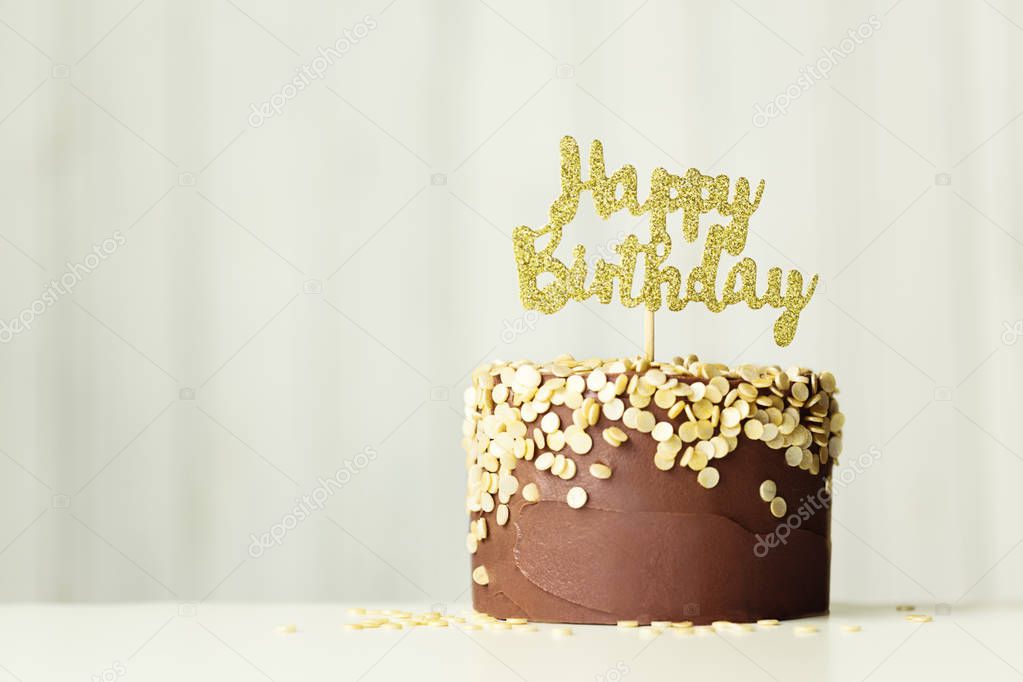 Chocolate and gold birthday cake