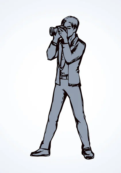 Fotograaf. Vector tekening — Stockvector