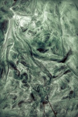 Modern yapay sentetik koyu renkli buruşuk rahatlama. Dalgalı, buruşuk kıvrımlı sarmal yapı. Üst ayrıntılı makro görünümü bej sevimli metin için boşluk ile kapat